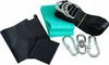 A collection of accessories for a swing set, including straps, carabiners, and a green mat. Produktbild-Vorschau