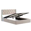 A beige upholstered bed frame with the mattress support mechanism open, revealing storage space underneath. The headboard has a diamond-stitched pattern and integrated LED lighting on the sides. Produktbild-Vorschau