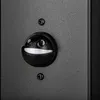 A close-up of a black outdoor light fixture with a motion sensor. Náhľad obrázku produktu
