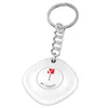 A white keychain finder device with a logo and text on it, attached to a silver keychain. Podgląd zdjęcia produktu