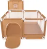 A beige and white playpen with a basketball hoop attachment. Podgląd zdjęcia produktu