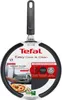 A Tefal crepe pan is shown in its packaging, with marketing information and a picture of a crepe. Voir les images du produit