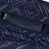 A close-up view of the interior zippered pocket of a navy blue duffel bag with a geometric pattern of purple and blue lines. Produktbild-Vorschau
