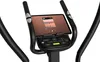 Close-up of the console and handlebars of an exercise bike with a tablet mounted on it. Produktbild-Vorschau
