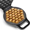 A bubble waffle maker with waffles inside. Produktbild-Vorschau