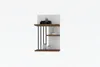 A wall-mounted shelf with decorative items. Produktbild-Vorschau