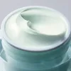 A close-up view of a jar of cream. Produktbild-Vorschau