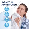 A woman is smelling a white shirt, with icons and text highlighting product features. Produktbild-Vorschau
