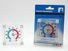A window thermometer in its packaging is shown next to a loose window thermometer on a white background. Produktbild-Vorschau