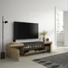 A modern TV stand with a built-in electric fireplace, featuring oak and black finishes, in a well-lit living room. Anteprima dell’immagine prodotto
