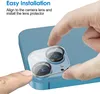 A hand is shown installing a camera lens protector onto a smartphone. Produktbild-Vorschau