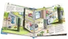 A pop-up book showing a cross-section of a modern house with a green roof, illustrating various robotic devices and their functions within the home and garden. Voir les images du produit