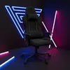 A gaming chair is displayed in a room with neon lights. Produktbild-Vorschau