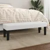 A white bench is placed in front of a bed in a bedroom setting. Produktbild-Vorschau