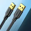 Two USB-A to USB-A cables with gold-plated connectors against a blue gradient background with digital patterns. Anteprima dell’immagine prodotto