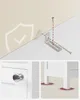 Collage of product features: anti-tip hardware, a drawer knob, and leg placement. Produktbild-Vorschau
