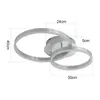 A diagram showing the dimensions of a modern LED ceiling light with two interlocking rings. Podgląd zdjęcia produktu