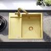 A gold sink with a faucet is shown from a top-down view, placed on a dark gray countertop. Produktbild-Vorschau