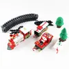 A Christmas-themed toy train set with tracks, trees, and a Santa sleigh. Náhľad obrázku produktu