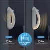 Two images of a white LED night light mounted on a wall, showing its operation in different modes. Podgląd zdjęcia produktu