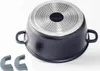 The bottom of a black pot with a silver, textured base is shown against a white background. Two grey silicone pot handle covers are in the bottom left corner. Produktbild-Vorschau