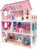 A pink wooden dollhouse with furniture and LED lights. Voir les images du produit