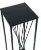 A close-up, angled view of a black metal plant stand with a square top and a twisted metal base, set against a white background. Anteprima dell’immagine prodotto