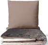 A stack of bedding, including a pillow and duvet, with a patterned design. Produktbild-Vorschau