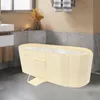 A portable bathtub filled with water and bubbles in a bathroom setting. Podgląd zdjęcia produktu