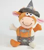 A plush toy cow dressed in traditional Bavarian attire, sitting against a white background. Produktbild-Vorschau