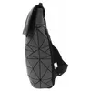 A side view of a gray backpack with a geometric pattern. Produktbild-Vorschau
