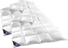 A white down comforter is laid out on a white background. Produktbild-Vorschau