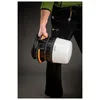A person is holding a work light. Anteprima dell’immagine prodotto