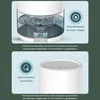 Two close-up images of a white humidifier, one showing the water tank and the other showing the top of the device with controls. Produktbild-Vorschau