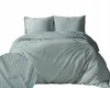 A neatly folded duvet and two pillows on a bed, all covered in mint green striped bedding. Náhled obrázku produktu