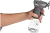A hand holds a grey spray bottle with a clear water bottle attached, against a white background. Produktbild-Vorschau