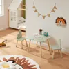 A child's bedroom with a bed, a table and chairs set, and toys. Anteprima dell’immagine prodotto