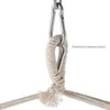 Close-up of a rope and metal carabiner attaching a hammock or swing. Náhled obrázku produktu