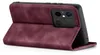 A burgundy flip case for a smartphone is shown standing open, revealing the phone's camera module. Produktbild-Vorschau