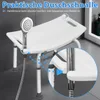 A white shower stool with a shower head holder in a bathroom setting. Produktbild-Vorschau