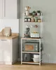 A kitchen baker's rack filled with various kitchen appliances and accessories. Náhled obrázku produktu