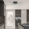 A modern kitchen with a sleek ceiling light fixture. Náhled obrázku produktu