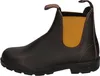 A side view of a brown leather Chelsea boot with mustard elastic inserts. Voir les images du produit