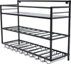 A black metal wall-mounted wine rack with three shelves. Náhled obrázku produktu