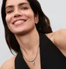 A woman wearing a necklace. Anteprima dell’immagine prodotto