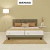 A bedroom scene with a bed, lamp, and side table. Náhľad obrázku produktu