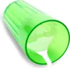 A green learning cup is shown lying on its side with liquid pouring out. Produktbild-Vorschau