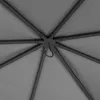 Close-up view of the internal structure of a gray umbrella or canopy, showing the metal frame and fabric. Náhled obrázku produktu