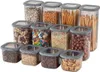 A collection of clear plastic food storage containers filled with various food items and toppings, arranged in a studio setting against a white background. Produktbild-Vorschau