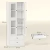 A white cabinet with glass doors and drawers, with dimensions indicated by text overlays. A separate drawer is shown with its dimensions. Voir les images du produit